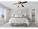 Comfortable bedroom with a ceiling fan and lots of natural light at 16197 Paris Way, Brighton, CO 80602