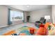 Bright Bonus Room features a large window that provides natural light and neighborhood views at 16197 Paris Way, Brighton, CO 80602