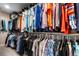 Organized closet with clothing racks provides generous storage for garments and personal items at 16197 Paris Way, Brighton, CO 80602