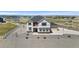 Spacious two-story home with landscaped front yard and three-car garage at 16197 Paris Way, Brighton, CO 80602