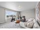 Cozy living room setup is perfect for relaxing or working out at 16197 Paris Way, Brighton, CO 80602