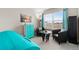 Comfortable living room area with large window, modern decor and plenty of space at 16197 Paris Way, Brighton, CO 80602