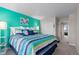 Serene main bedroom with an en-suite bathroom and a spacious closet at 16197 Paris Way, Brighton, CO 80602