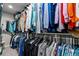 Spacious walk-in closet features ample storage and organization options at 16197 Paris Way, Brighton, CO 80602