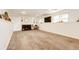 Spacious finished basement with cozy fireplace and large windows for natural light at 978 S Salida St, Aurora, CO 80017