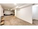 Spacious unfinished basement area with neutral carpeting and ample open space at 978 S Salida St, Aurora, CO 80017