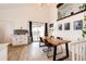 Modern dining area featuring a wooden table, contemporary decor, and ample natural light at 978 S Salida St, Aurora, CO 80017