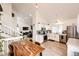 Open concept view of the kitchen and dining area featuring modern appliances and an inviting atmosphere at 978 S Salida St, Aurora, CO 80017
