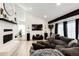 Bright living room with a vaulted ceiling, fireplace, and comfortable seating area at 978 S Salida St, Aurora, CO 80017