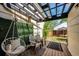 Covered patio with comfortable seating, perfect for relaxing outdoors at 978 S Salida St, Aurora, CO 80017