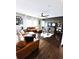 Well-decorated living room with a cozy atmosphere, featuring a large sectional and modern fixtures at 15468 W 50Th Pl, Golden, CO 80403