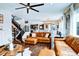 Inviting living room, seamlessly connected to the kitchen and dining area, offers a bright, open space at 15468 W 50Th Pl, Golden, CO 80403