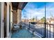 Relaxing outdoor balcony with seating and neighborhood views at 11830 W 52Nd Ave, Wheat Ridge, CO 80033