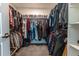 Well-organized walk-in closet, perfect for wardrobe storage and keeping clothing and shoes organized at 11830 W 52Nd Ave, Wheat Ridge, CO 80033