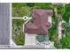 Expansive single Gathering home with lovely lawn, mature trees, and large driveway at 7170 Windwood Way, Parker, CO 80134