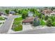 This single Gathering home has an oversized three car garage, lovely lawn, and mature trees at 7170 Windwood Way, Parker, CO 80134