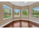 Charming breakfast nook bathed in natural light, offering a cozy space for morning meals and relaxation at 7170 Windwood Way, Parker, CO 80134