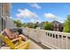 Inviting balcony offers neighborhood views with comfortable seating, perfect for relaxing and enjoying the outdoors at 2856 Shadow Lake Rd, Lafayette, CO 80026