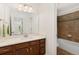 Bathroom featuring a single sink, vanity, and a shower-tub combination at 2856 Shadow Lake Rd, Lafayette, CO 80026