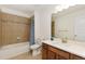 Neutral bathroom with tub and shower combination, and ample countertop space at 2856 Shadow Lake Rd, Lafayette, CO 80026