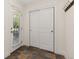 Functional entryway features a closet, stylish tile flooring, and a door leading to the outside at 2856 Shadow Lake Rd, Lafayette, CO 80026