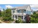 Charming two-story home featuring dual-tone exterior paint, a second-story balcony, and a welcoming front porch at 2856 Shadow Lake Rd, Lafayette, CO 80026