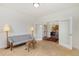 Comfortable living room with a sofa and connecting to a dining room through French doors at 2856 Shadow Lake Rd, Lafayette, CO 80026