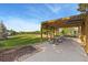 Community park featuring picnic tables under a wooden shelter with grassy areas and trees at 2856 Shadow Lake Rd, Lafayette, CO 80026