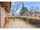 Wooden deck with black iron railings, great for outdoor living and entertaining at 9720 W Kentucky Dr, Lakewood, CO 80226