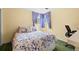 Comfortable bedroom with a bright window and classic decor at 9720 W Kentucky Dr, Lakewood, CO 80226