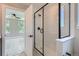 Modern bathroom with glass shower, sleek fixtures, and en-suite access to bedroom, creating a luxurious retreat at 3420 N Steele St, Denver, CO 80205
