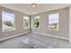 Spacious bedroom with abundant natural light from three windows, ready for personalization at 3420 N Steele St, Denver, CO 80205