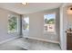 Bright bedroom featuring three large windows offering plenty of natural light at 3420 N Steele St, Denver, CO 80205