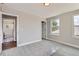 Inviting bedroom with en-suite bathroom and ample natural light from large windows at 3420 N Steele St, Denver, CO 80205