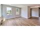 Spacious living room boasts ample natural light, creating a warm and inviting atmosphere at 3420 N Steele St, Denver, CO 80205