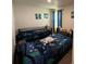 bedroom featuring bunk beds, colorful decor, and a comfortable atmosphere at 2003 Monte Vista Dr, Lochbuie, CO 80603