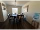 Elegant dining room with a modern table and chairs, perfect for Gathering meals and gatherings at 2003 Monte Vista Dr, Lochbuie, CO 80603