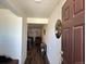 Inviting foyer leading to a living space with stylish decor at 2003 Monte Vista Dr, Lochbuie, CO 80603