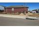 Spacious side yard featuring a wood fence and plenty of room for outdoor activities at 2003 Monte Vista Dr, Lochbuie, CO 80603