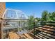Charming balcony featuring a greenhouse, providing a perfect space for gardening enthusiasts at 4258 Tennyson St, Denver, CO 80212