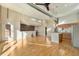 Open living space with brick accent wall and modern kitchen at 4258 Tennyson St, Denver, CO 80212
