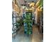 Charming retail space featuring open shelving, unique light fixtures, and crane-themed wallpaper at 4258 Tennyson St, Denver, CO 80212