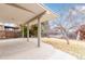 Spacious covered patio with a view of the backyard, great for entertaining at 430 Aspen Ct, Broomfield, CO 80020