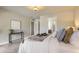 Comfortable bedroom featuring carpet and a large bed at 2700 E Louisiana Ave # 203, Denver, CO 80210