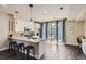 Modern kitchen featuring stainless steel appliances, granite countertops, and hardwood floors at 2700 E Louisiana Ave # 203, Denver, CO 80210