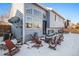 Spacious backyard with patio furniture and fire pit at 3738 Rosewalk Ct, Highlands Ranch, CO 80129