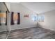 Spacious bedroom with wood-look floors and large windows at 3738 Rosewalk Ct, Highlands Ranch, CO 80129
