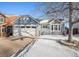 Charming home with a two-car garage and a well-maintained front yard at 3738 Rosewalk Ct, Highlands Ranch, CO 80129