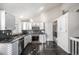 Modern kitchen with stainless steel appliances and granite counters at 3738 Rosewalk Ct, Highlands Ranch, CO 80129