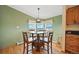Cozy breakfast nook with views of the fields beyond at 13080 County Road 19, Platteville, CO 80651